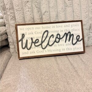 Charming Welcome Sign with Black Script and Brown Frame